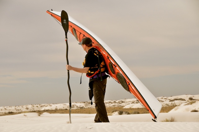 Kayak surfing the sand dunes at White Sands National Park, NM